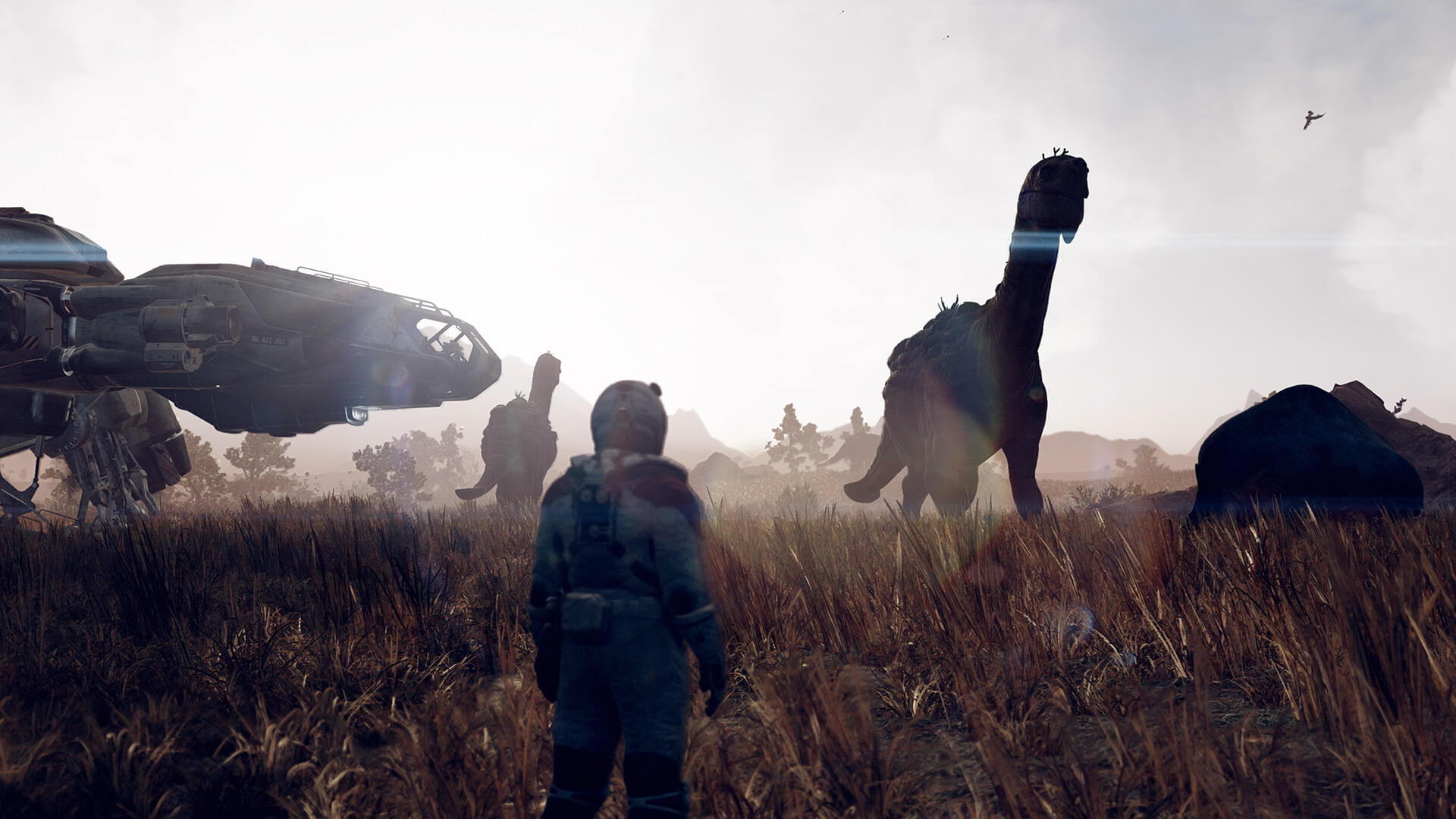 A player looking out at a field of dinosaurs in Starfield, a ZeniMax game