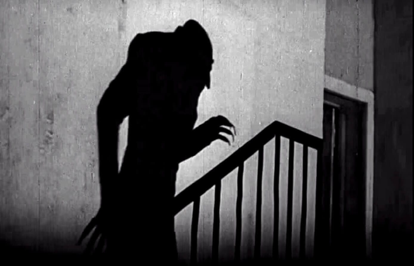 Nosferatu, the ancient vampire, casts an ominous shadow.