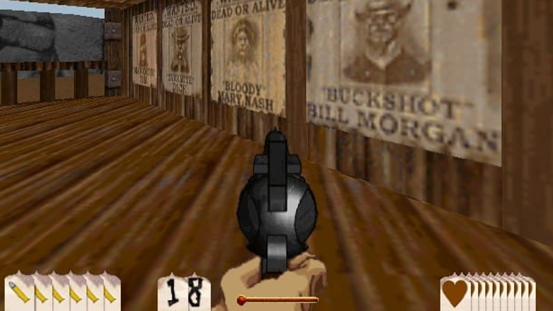 A person can be seen aiming a gun at some wanted posters