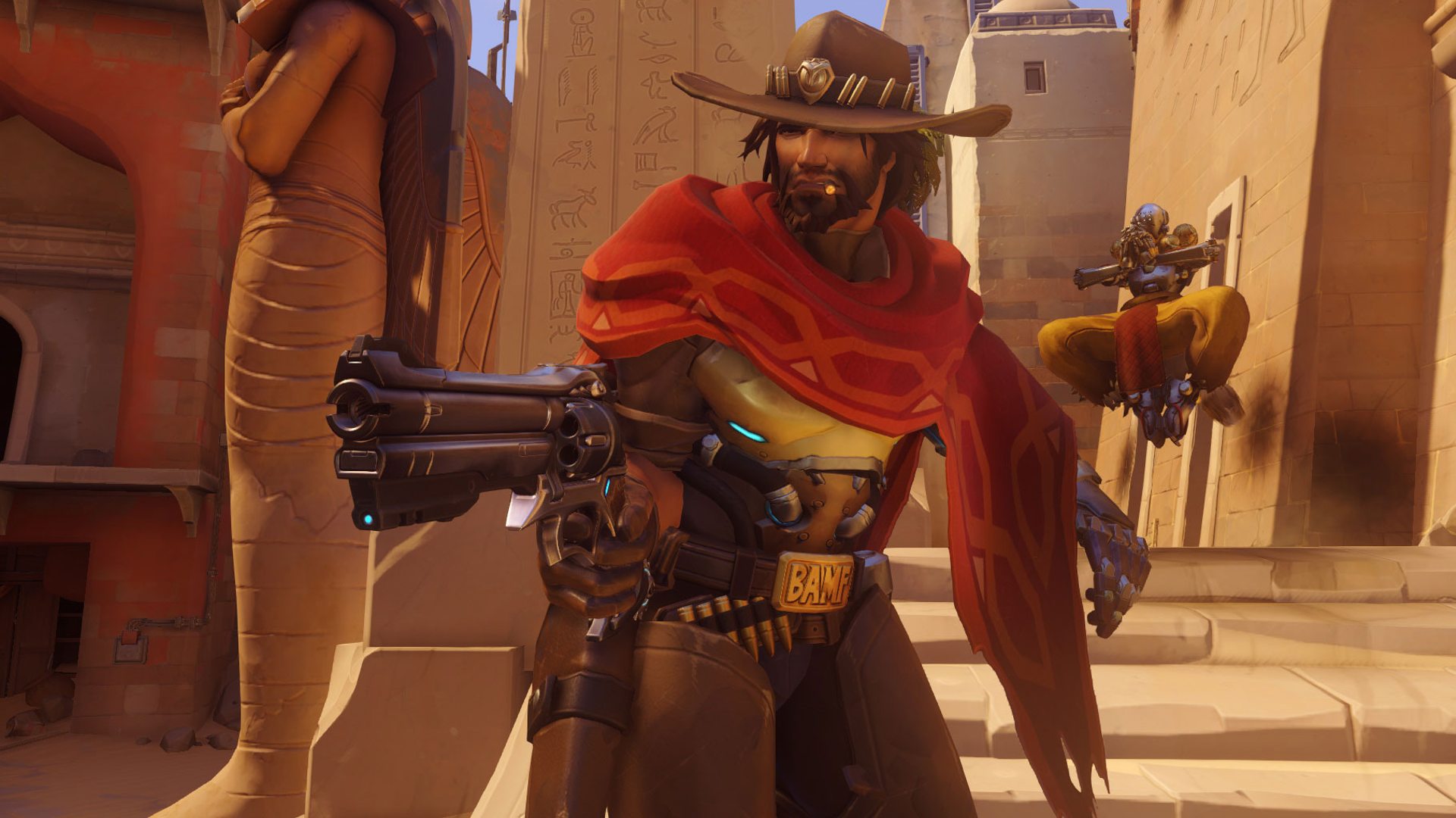 McCree can be seen aiming his weapon in a match with Zenyata behind him