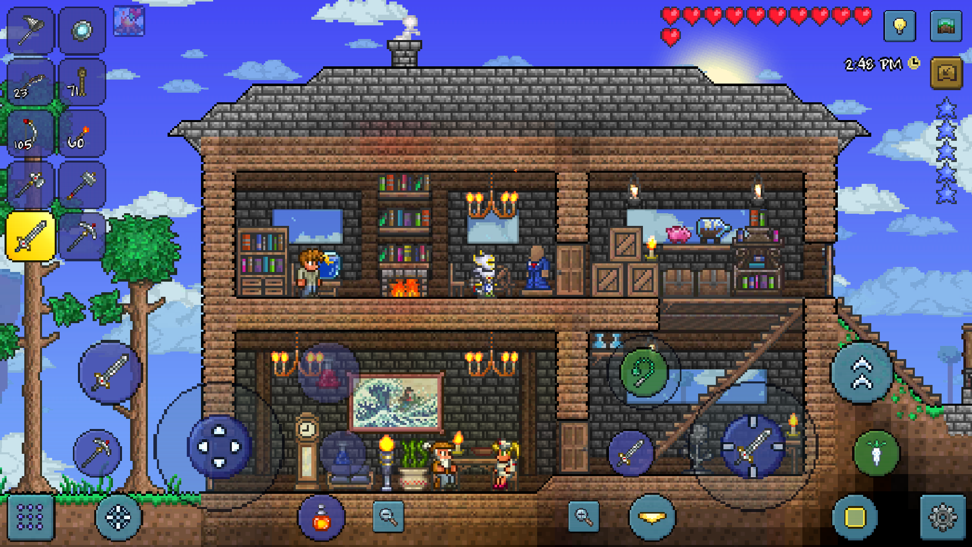Terraria gameplay scene with a house built 