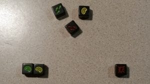 The second roll of a players turn. Brains to the left, blasts to the right, and the second roll is in the middle.