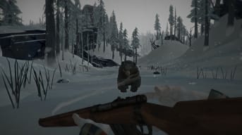 The player facing off against a bear in The Long Dark