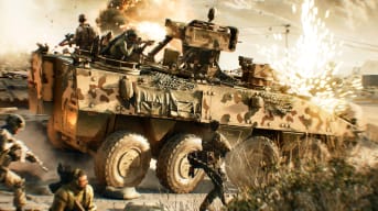 A tank rolling through an active warzone in Battlefield 2042