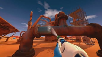 The player spraying a filthy pipe until it's clean in PowerWash Simulator