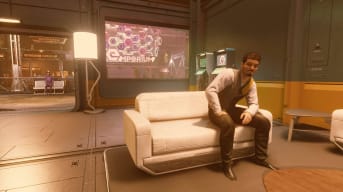 Starfield Miguel Rivas Mission Guide - Speak to Erika - Cover Image Miguel Rivas Sitting on a Couch in the Volii Hotel in Neon Core