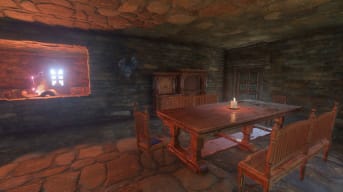 Enshrouded Building and Comfort Guide - Cover Image Table and Cabinets Inside of a Stone House