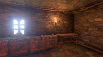 Enshrouded Crafting Guide - Cover Image Workbench Next to Several Storage Chests in a Stone Building