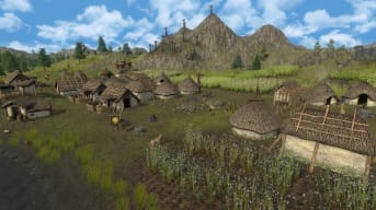 game screenshot showing an ancient rural village constructed of wattle and daub with thatched roofs. 