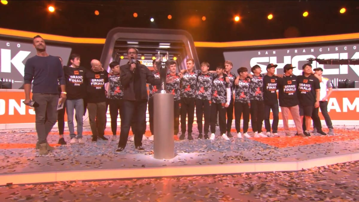 Overwatch Game Director Jeff Kaplan presents the San Francisco Shock with their trophy