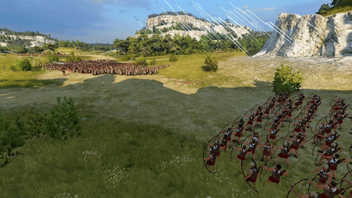 Bowmen unleash a volley of arrows at their enemies in A Total War Saga: Troy