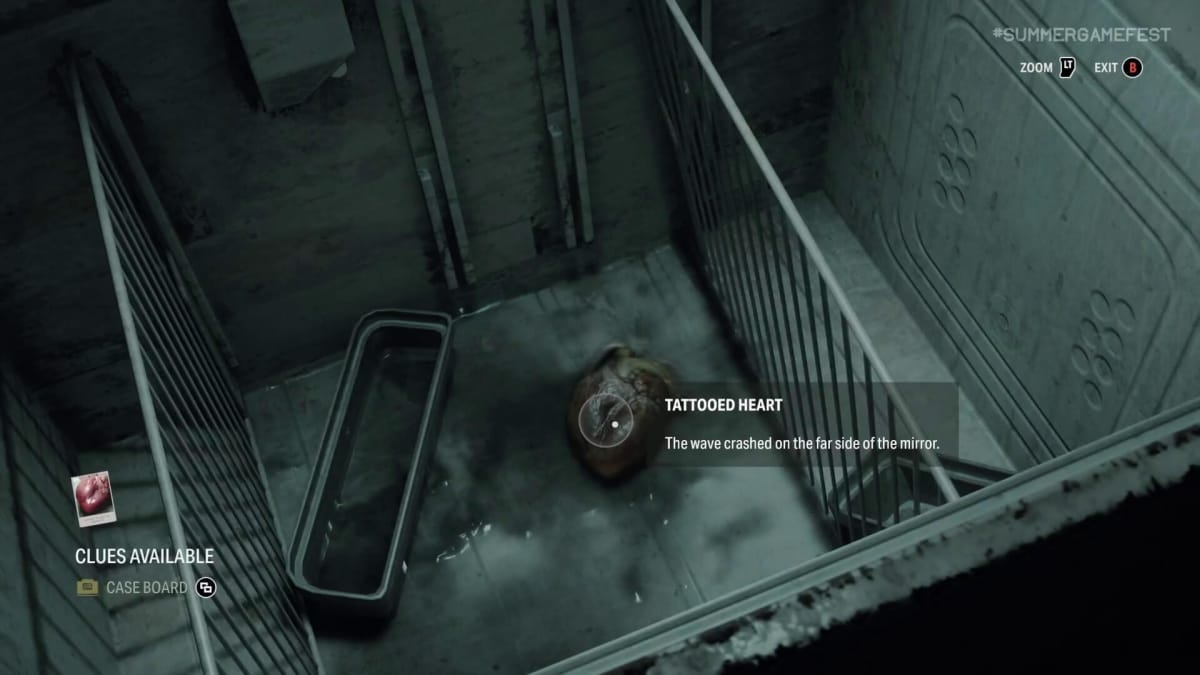 Alan Wake 2 Saga investigating a freezer that has a heart in it