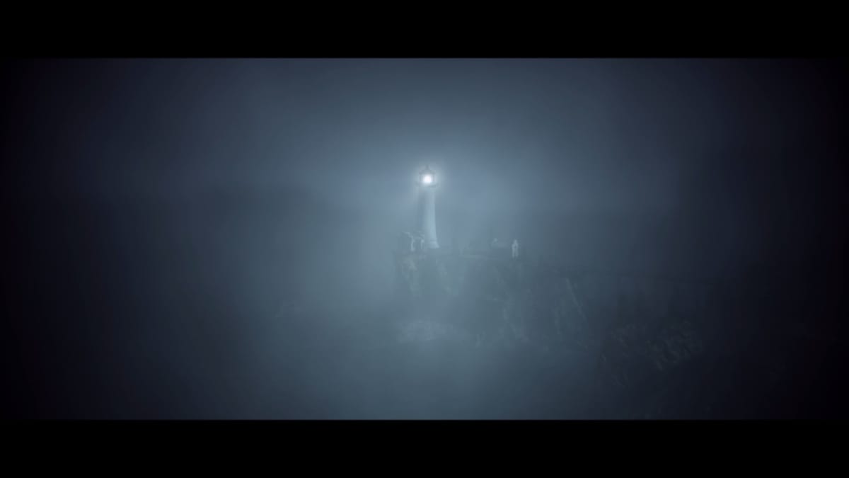 A lighthouse shining through a foggy night