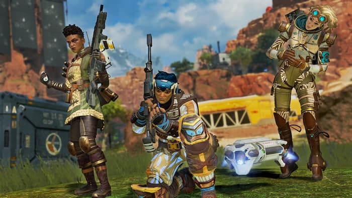 Apex Legends Hunted Update, photo of three characters standing side by side in the desert aiming their guns and ready for battle