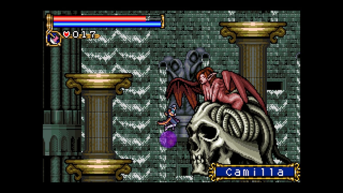 Nathan Graves fighting a giant demon woman on a giant skull