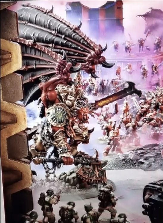 A blurry image of Chaos Daemons and Imperial Guardsman fighting
