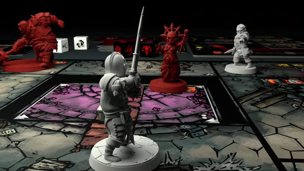 Miniatures facing off against each other in the Darkest Dungeon board game