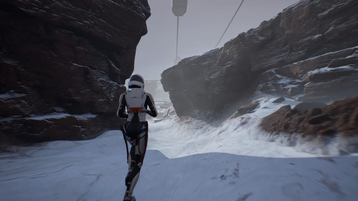 Kathy running through a snowy canyon in Deliver Us Mars