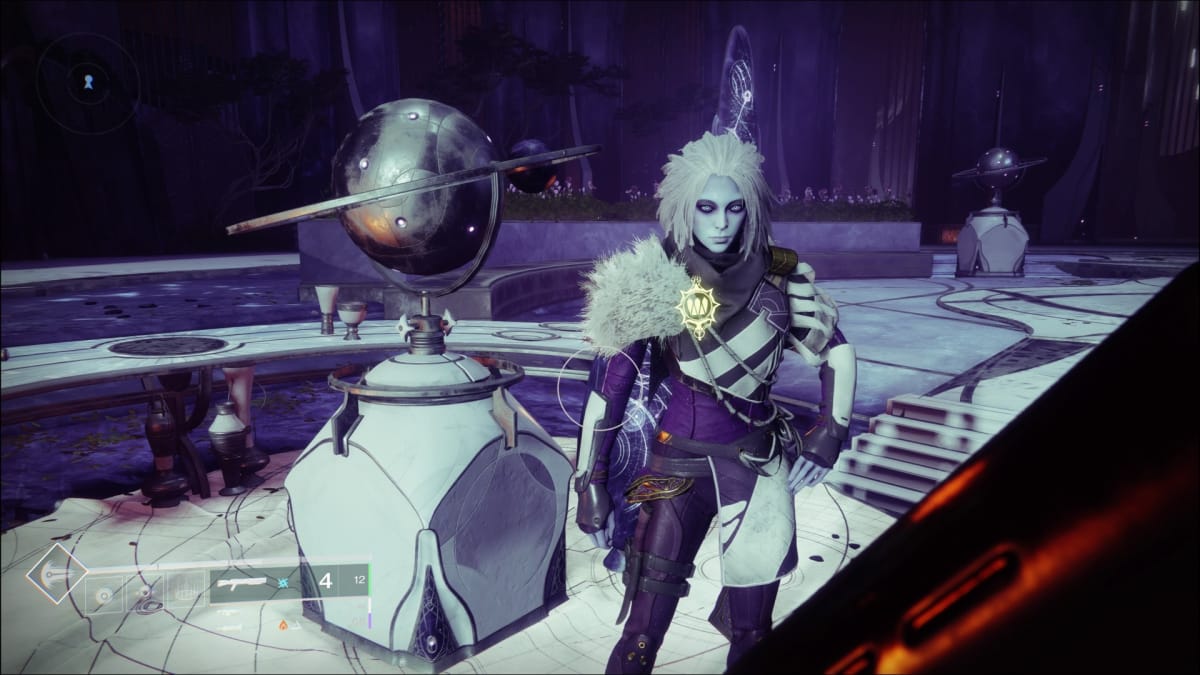 The Queen Mara Sov standing next to a table