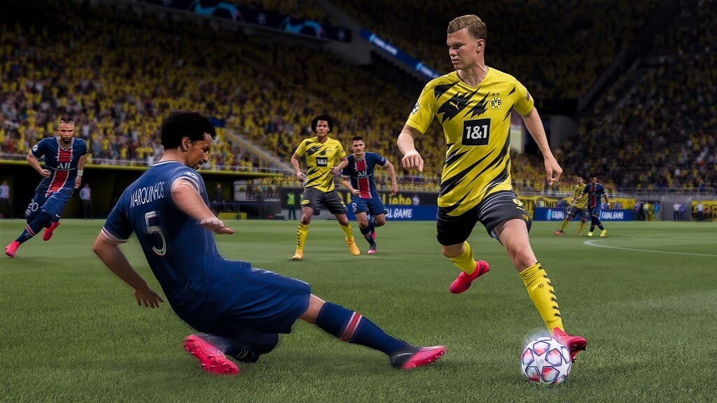 Two players jostling for the ball in FIFA 21
