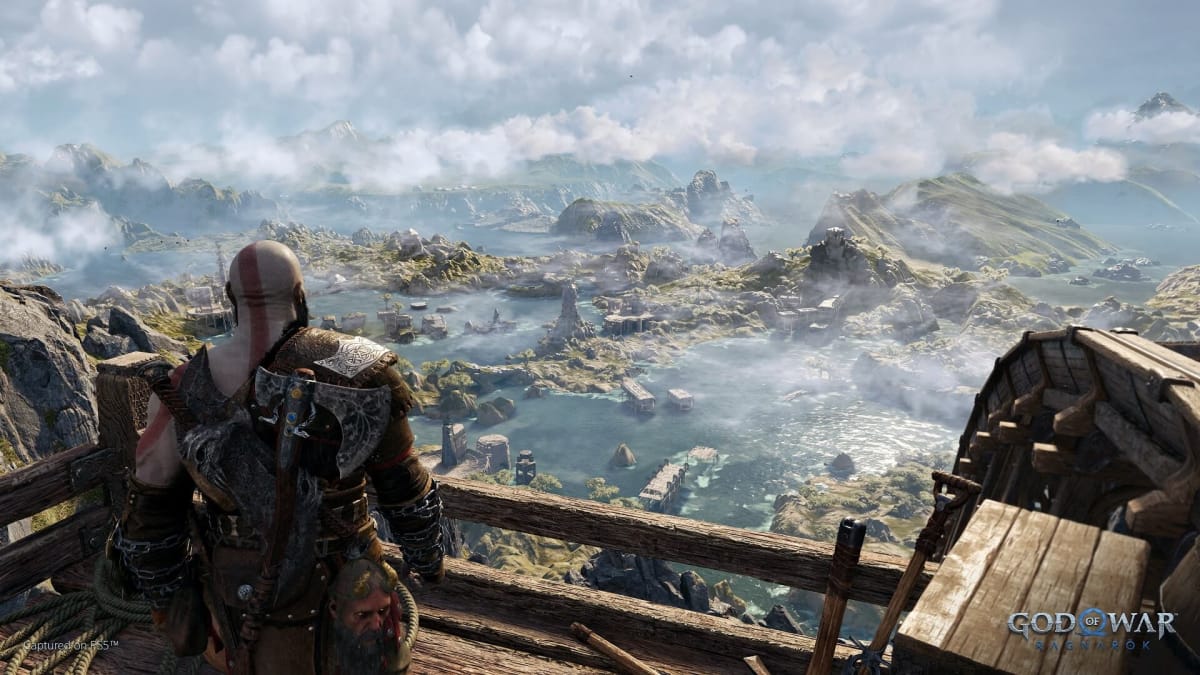Kratos looking out over a beautiful landscape in God of War Ragnarok