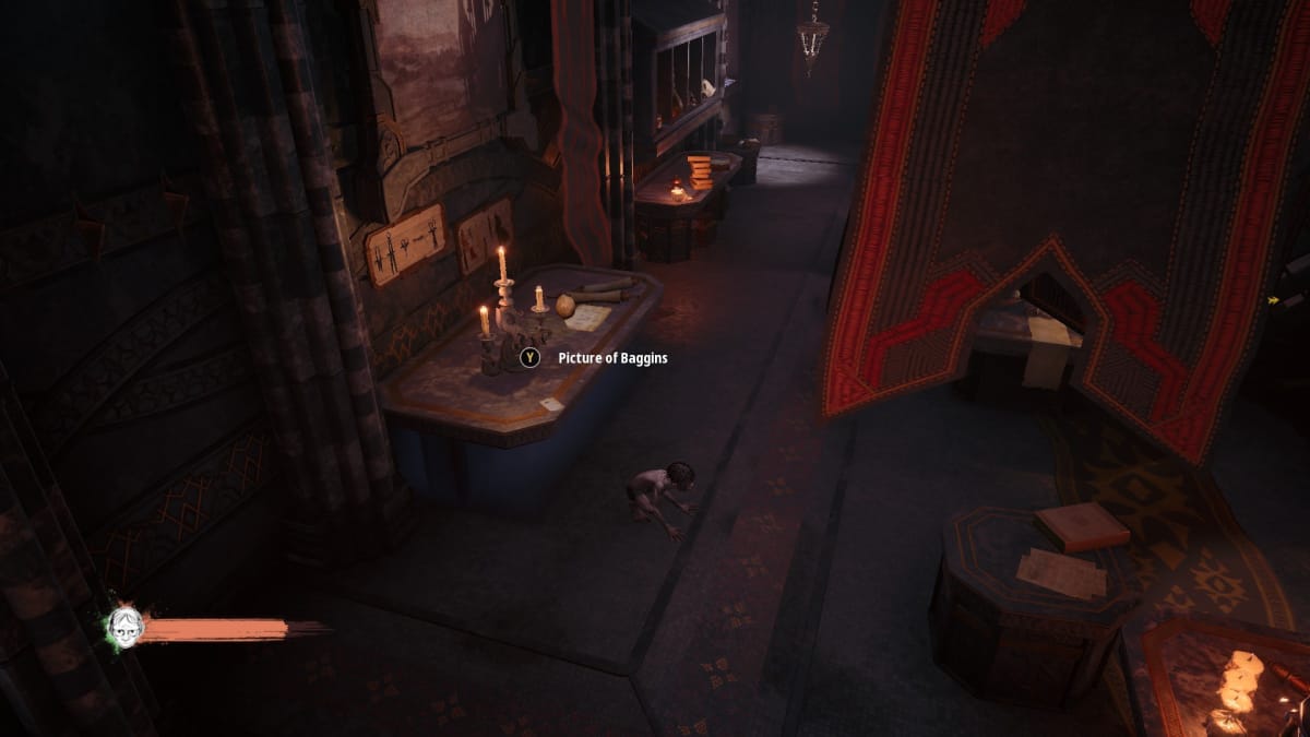 Gollum screenshot showing a dark-wood-pannelled room with several desks. One fo the desks contains an image while Gollum stands nearby. 