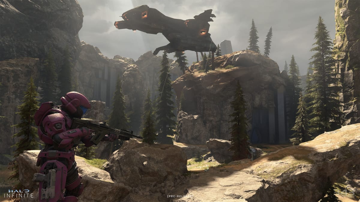 A Spartan standing atop a cliff in Halo Infinite