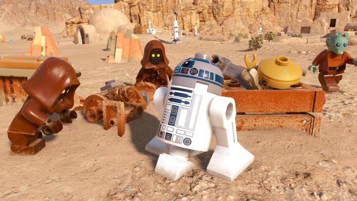 R2-D2 and some Jawas in LEGO Star Wars: The Skywalker Saga.