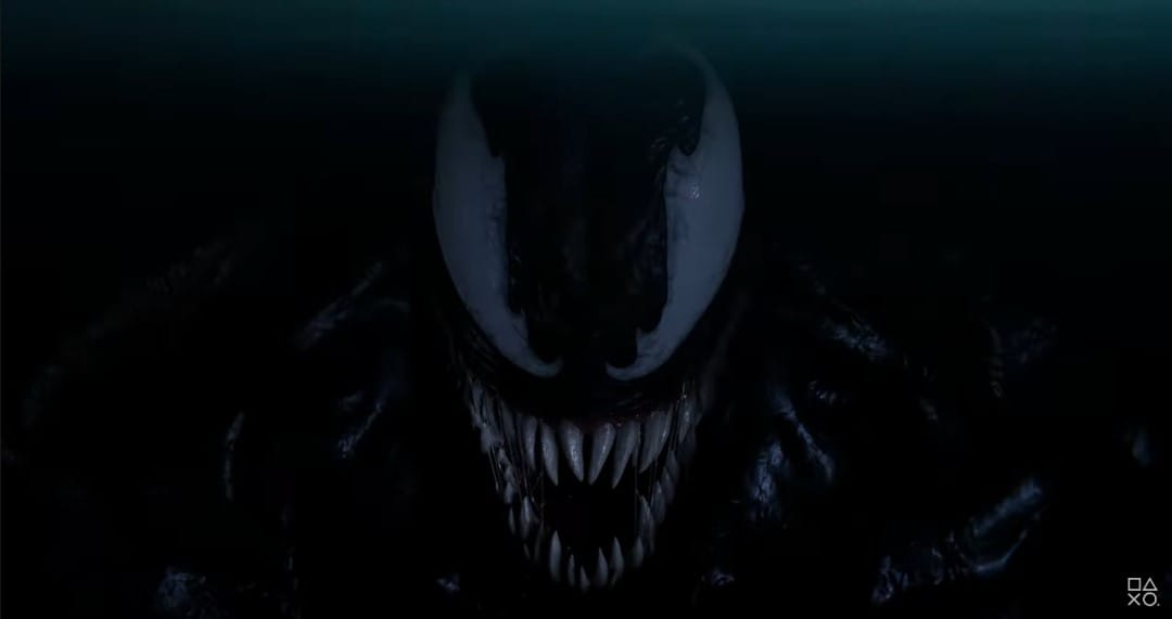 The black and white face of Venom in the darkness