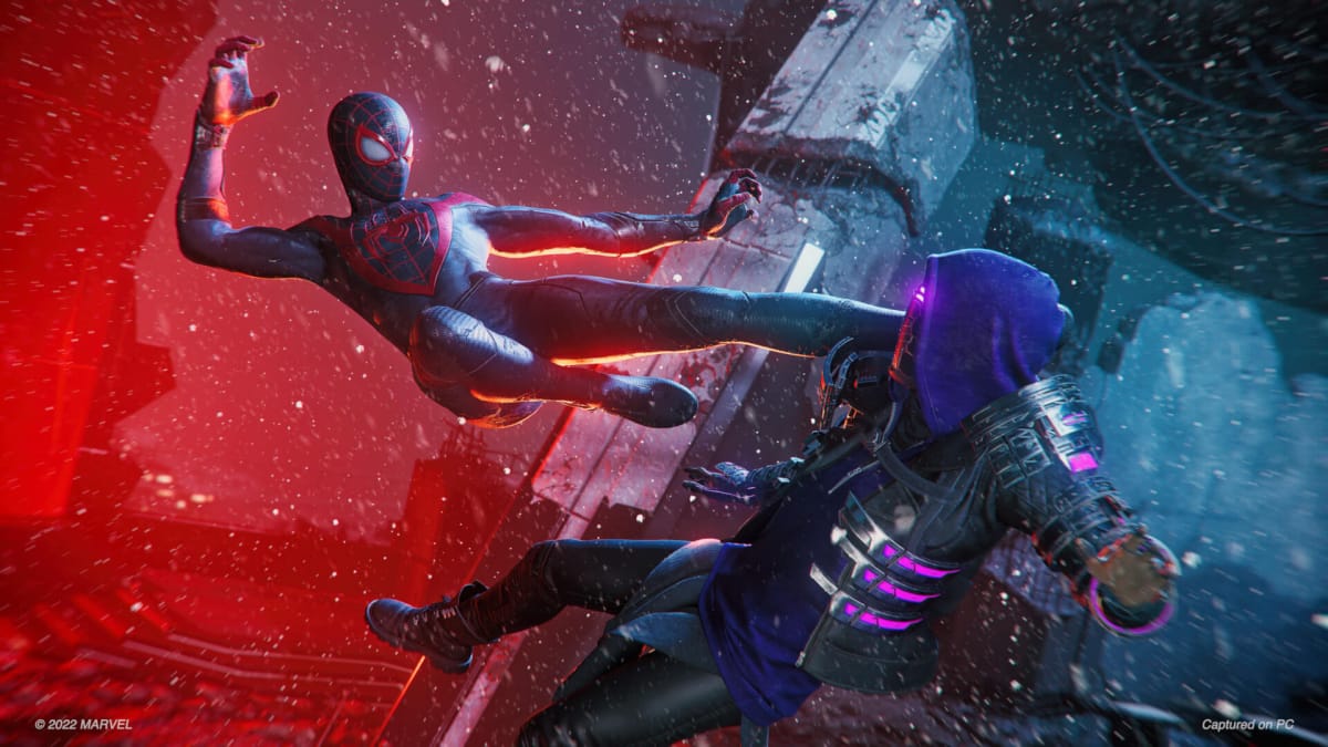 Miles Morales as Spider-Man kicking Tinkerer in the face in the Marvel's Spider-Man: Miles Morales PC version