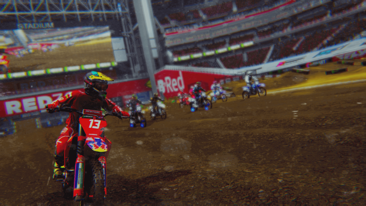 An in-game screenshot of Monster Energy Supercross 6, showcasing a rider in focus pulling ahead of several others.