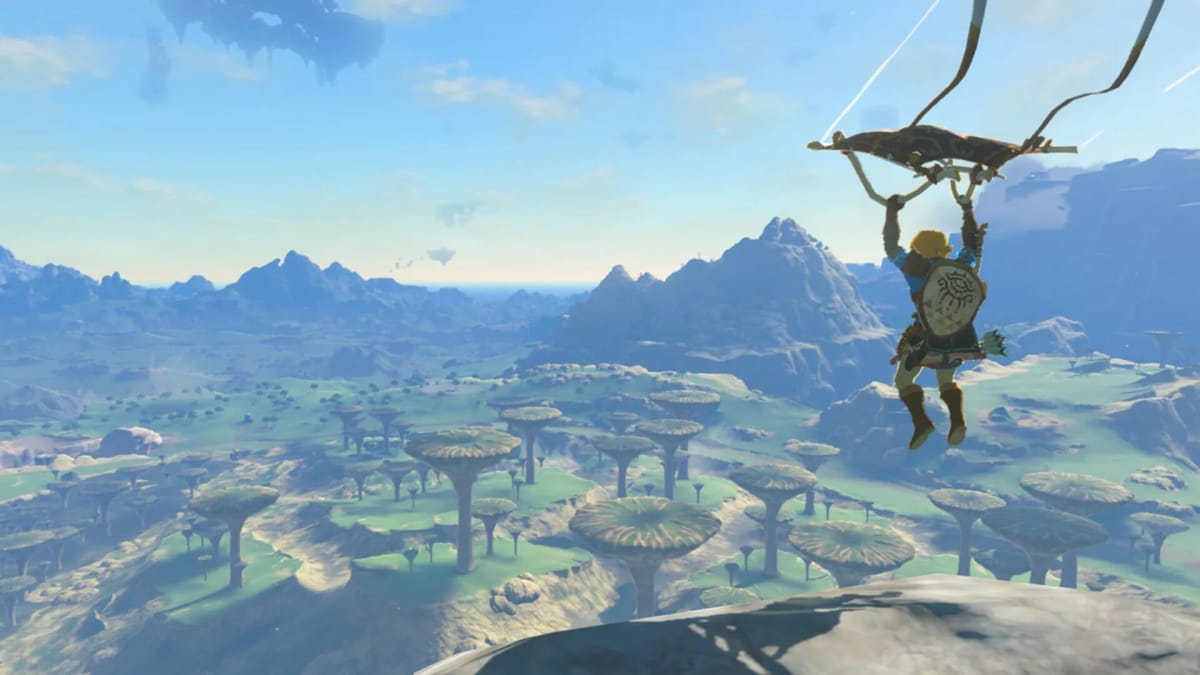 Link soaring through the air on a glider in The Legend of Zelda: Tears of the Kingdom, a Nintendo game