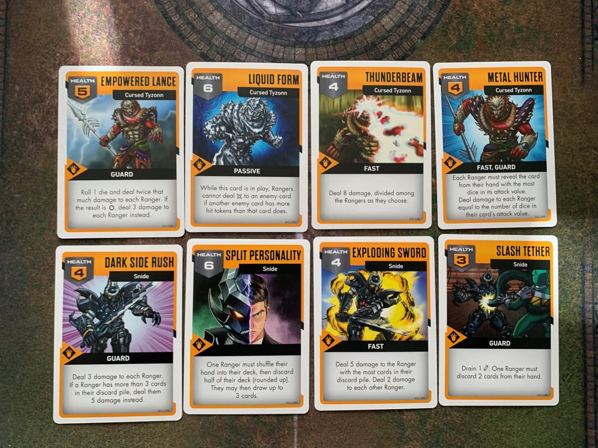 A handful of Corrupted Tyzonn and Snide cards from Power Rangers Light and Darkness