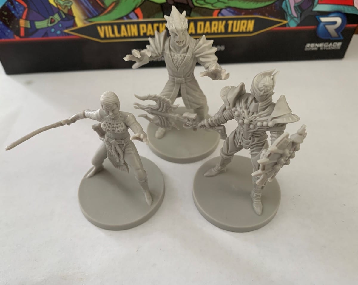 The miniatures for Elsa, Mesogog, and Zeltrax from Villain Pack 4
