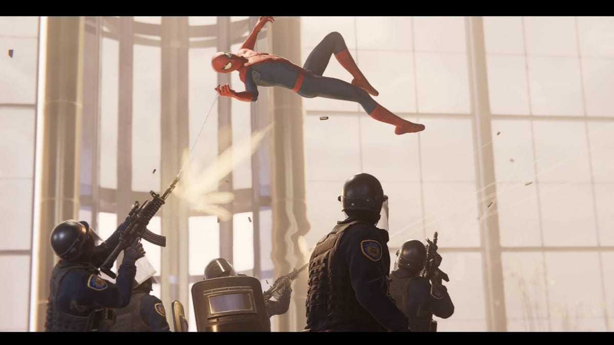 Spider-Man webs up goons at the beginning of the PC version of his game.