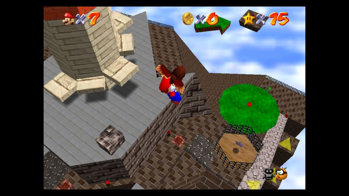 Mario holding on to an owl while floating over dangerous terrain