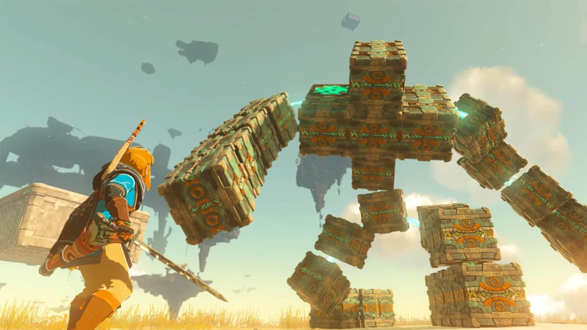 Link facing off against a giant rock statue in The Legend of Zelda: Tears of the Kingdom