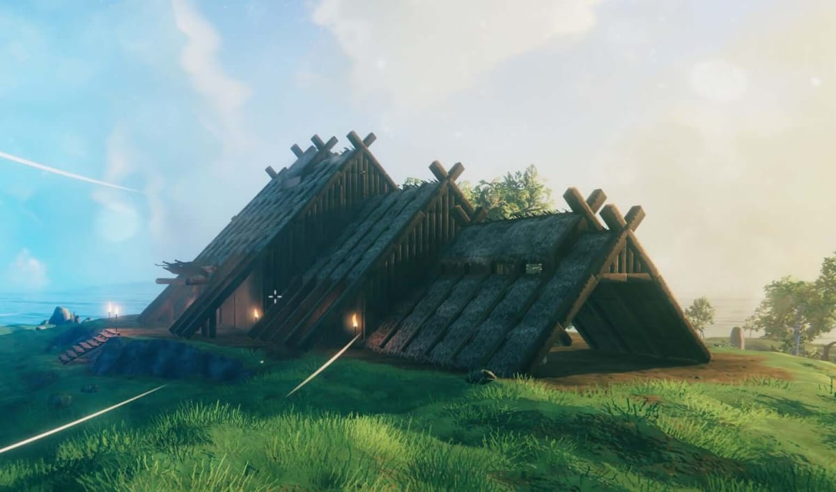 A longhouse in Valheim created by a Reddit user and their wife.