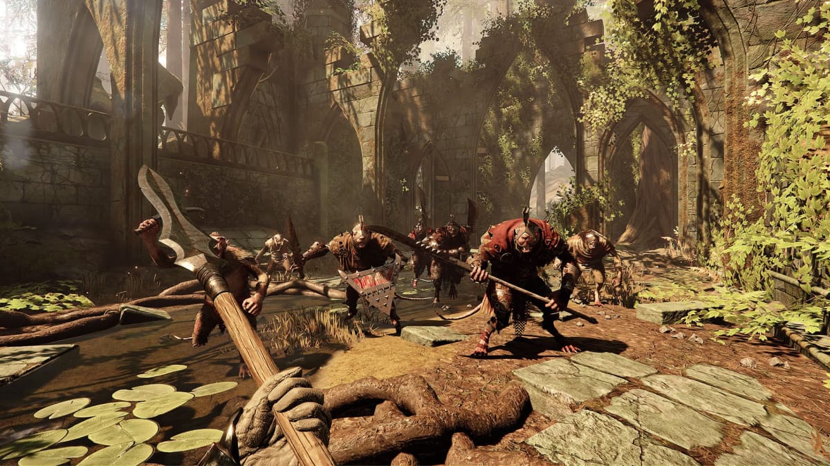 Vermintide 2 free screenshot where we see a horde of creatures running toward the player armed with shields and spears. 