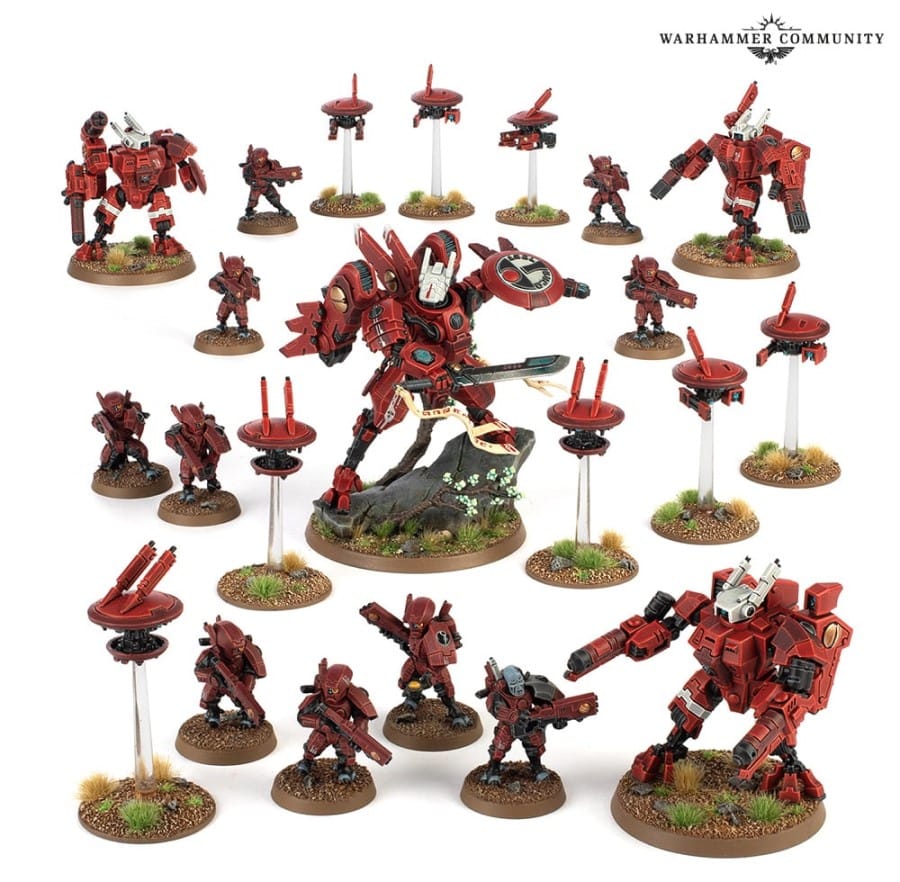 Several Tau miniatures, all painted in red and black, featured in Arks of Omen: Farsight