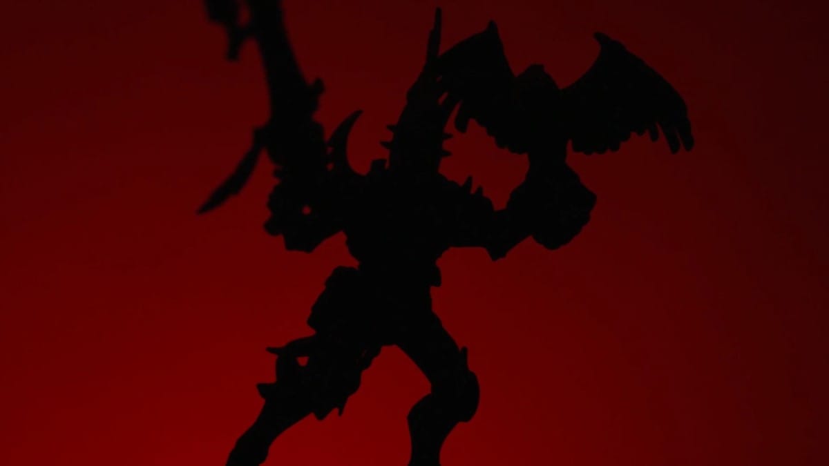 A screenshot of a blacked out miniature from the Warhammer 40k teaser trailer for 2023