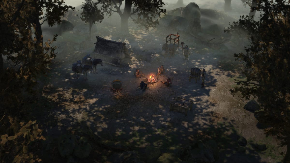 Wartales screenshot shows four characters gathered around a fire.