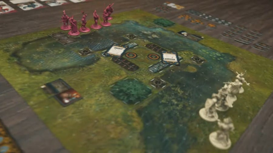 A game board set-up for A Song of Ice & Fire: Tactics, showing terrain, tokens, and miniatures.