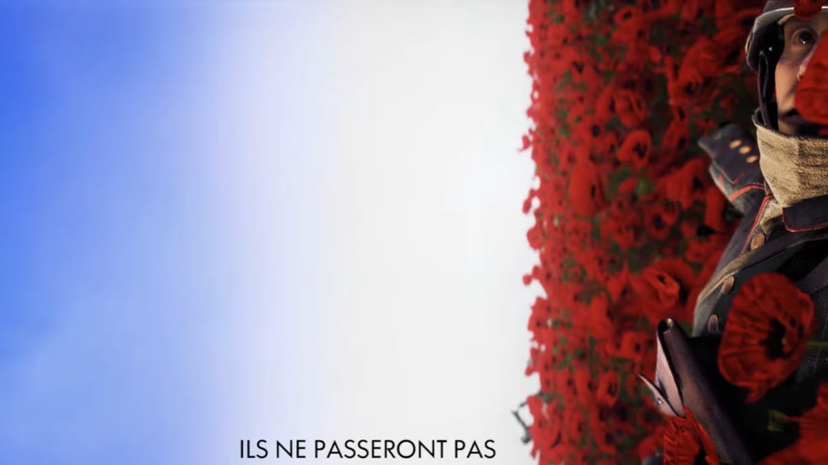 A memorium line of text can be seen. A person is laying in a bed of poppies