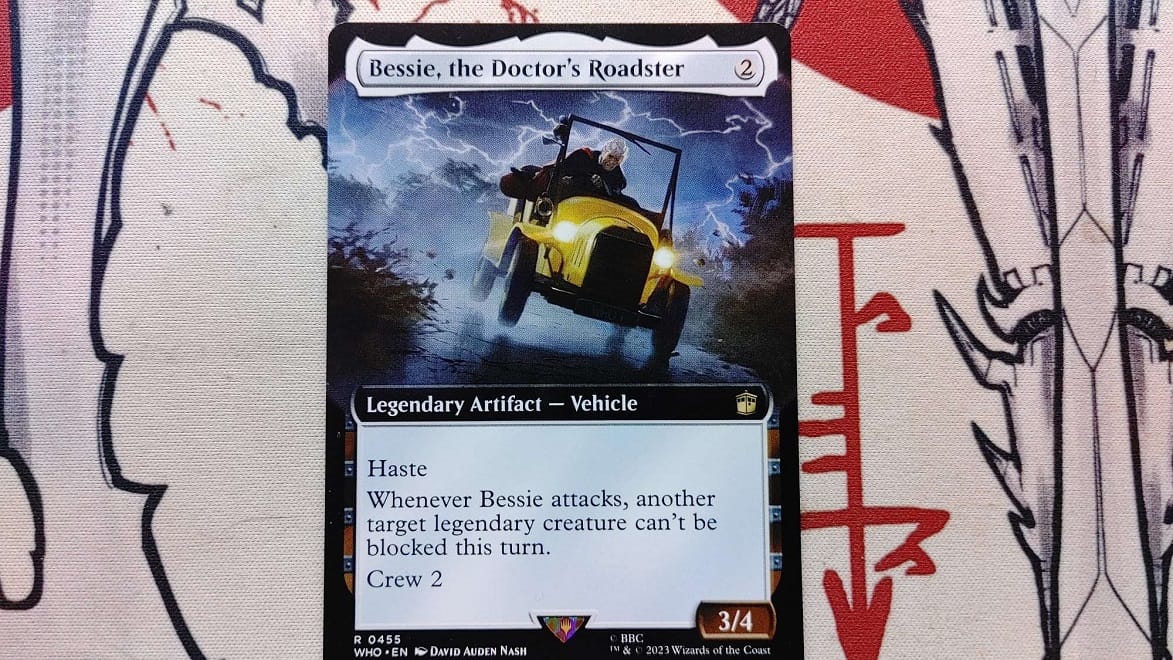 Bessie, the Doctor's Roadster on a phyrexian playmat