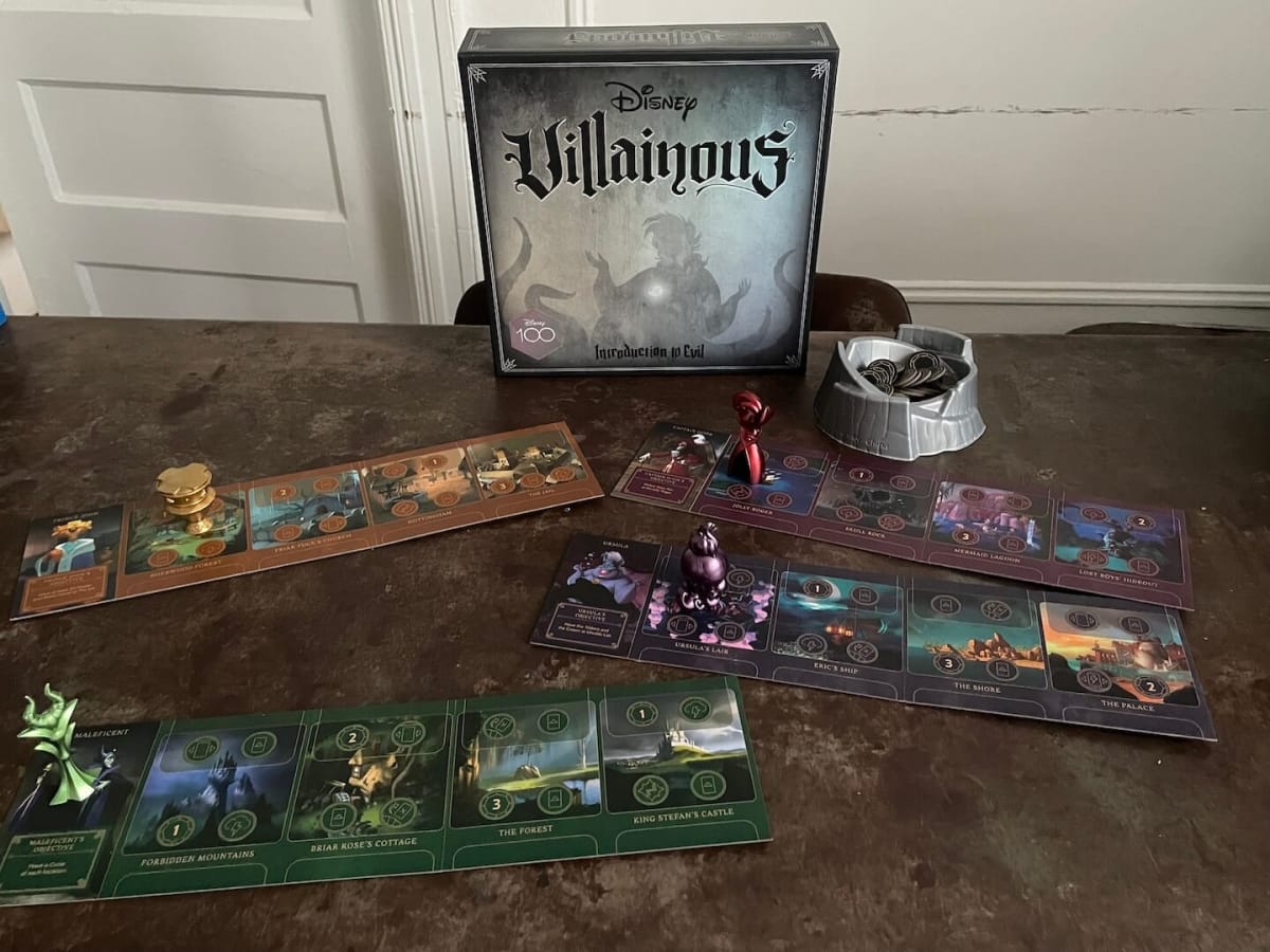 An image of the box and several board from Disney Villainous: Introduction to Evil as part of our Best New Horror Board Games roundup