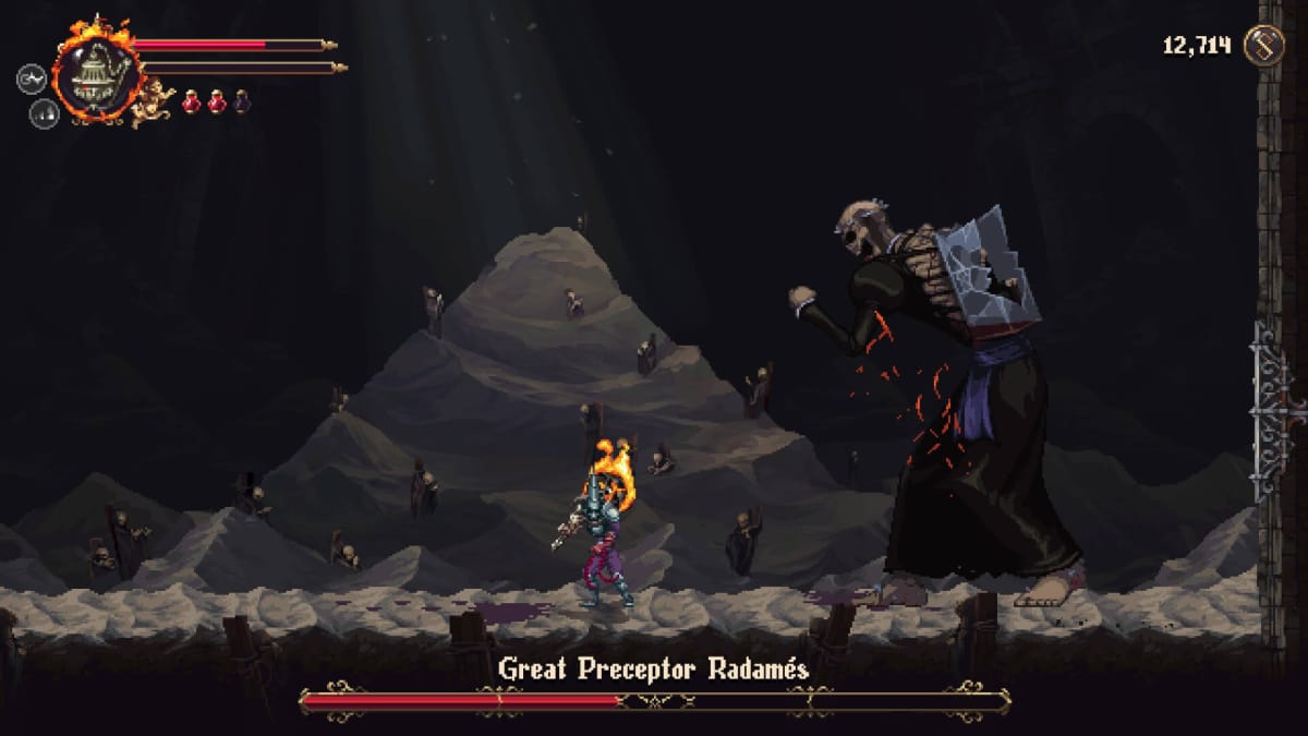 The Penitent One fighting the boss Great Preceptor Radames, who is a massive skeleton, in Blasphemous 2
