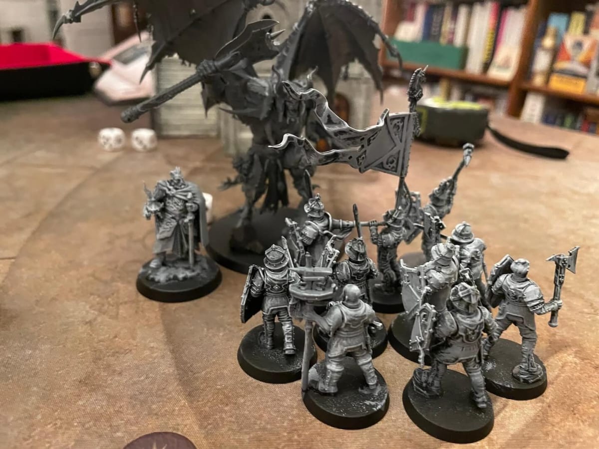 Cities of Sigmar Army Set Review Photo depicting the army facing off against a Daemon Prince