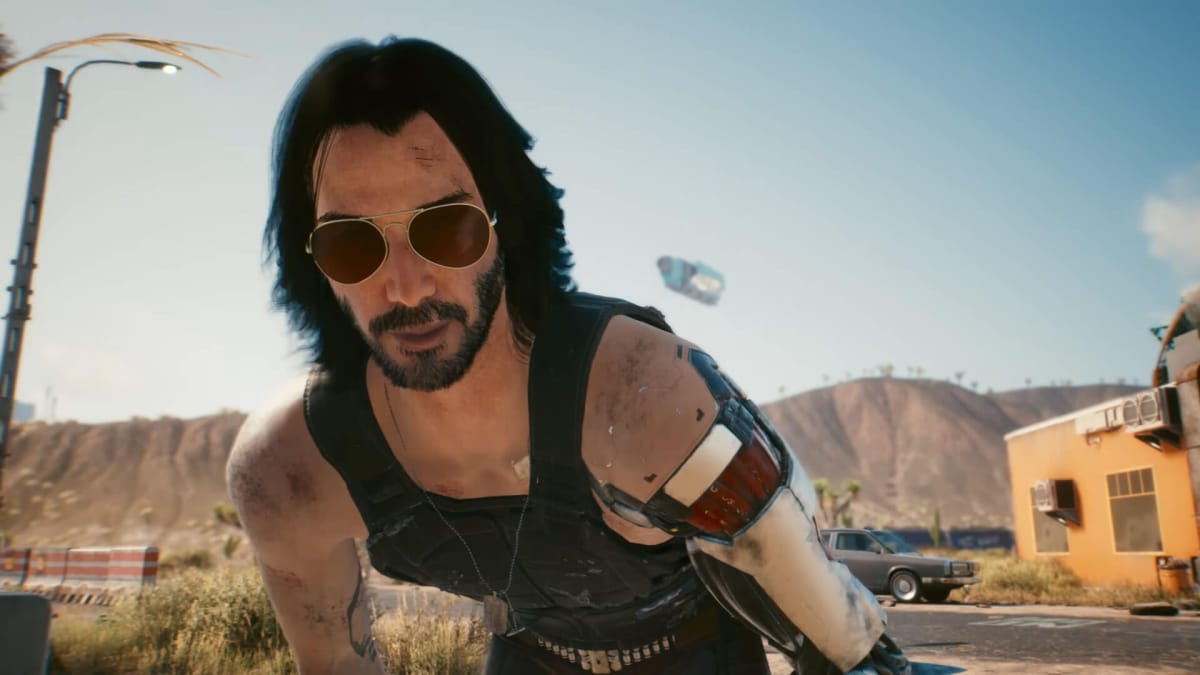Johnny Silverhand leaning down and talking to V in Cyberpunk 2077