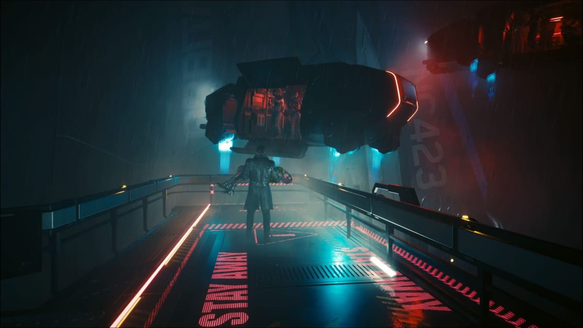 Image in Cyberpunk 2077 of Songbird being carried into a vehicle